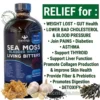 Marketing image for 'Mandingo' Sea Moss and Bladderwrack Living Bitters supplement. The central element is a large, dark glass bottle with a detailed blue label. To the right, a list of green bullet points highlights various health benefits under the title "RELIEF for :". At the bottom, raw natural ingredients including sea moss, garlic, and black seeds illustrate the natural components, with a watermark 'www.theorganicmade.com'. The overall style is professional and clean