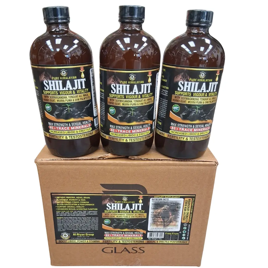 Shilajit Himalayan Mountain Tonic - Wholesale 1 a row of three glass bottles of "Organic SHILAJIT Himalayan Mountain TONIC" on top of their original, branded cardboard display box, set against a white background. The labels clearly show the brand and full ingredient list. Wholesale