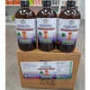 Prostate Gland Health Formula Bitters 16 Oz AIH- (Wholesale) 2 A Clean photograph showing three large, amber glass bottles of "Complete Prostate Gland Health Formula" with black caps, positioned side-by-side on top of a sealed cardboard box. Each bottle features a detailed blue and white label with the product name and key health claims. The cardboard box also has a larger, full label affixed to the front, displaying the supplement facts panel and product description. The image is taken from a three-quarter view, slightly elevated. A large, transparent watermark text "Theorganicmade.com" overlays the lower half of the image. The bottles are filled with a liquid supplement. The packaging looks secure and professional.